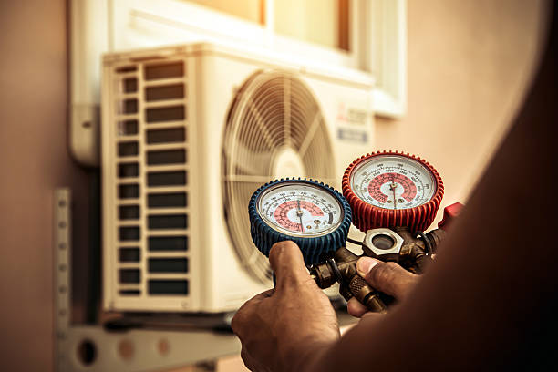 Professional Air Conditioning Service technician working in Baltimore, MD